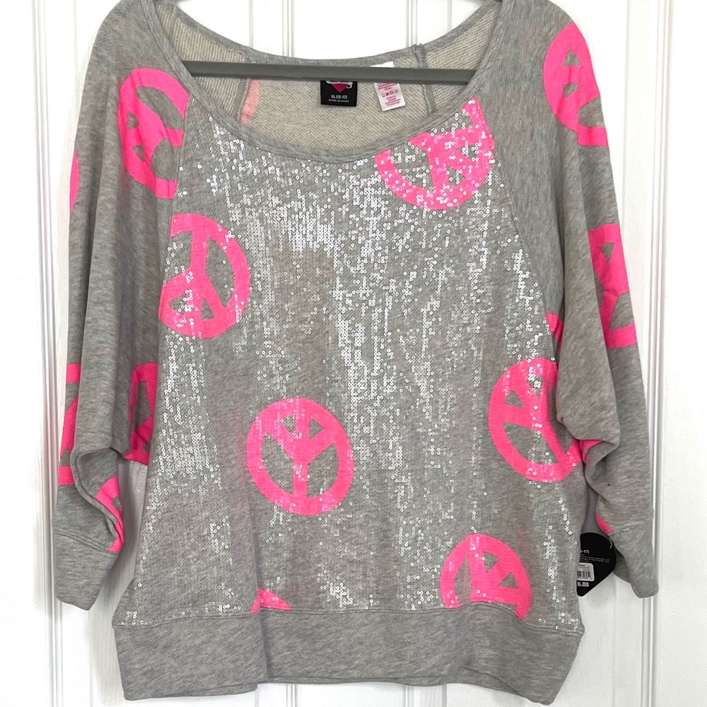 Peace sign sweat shirt.